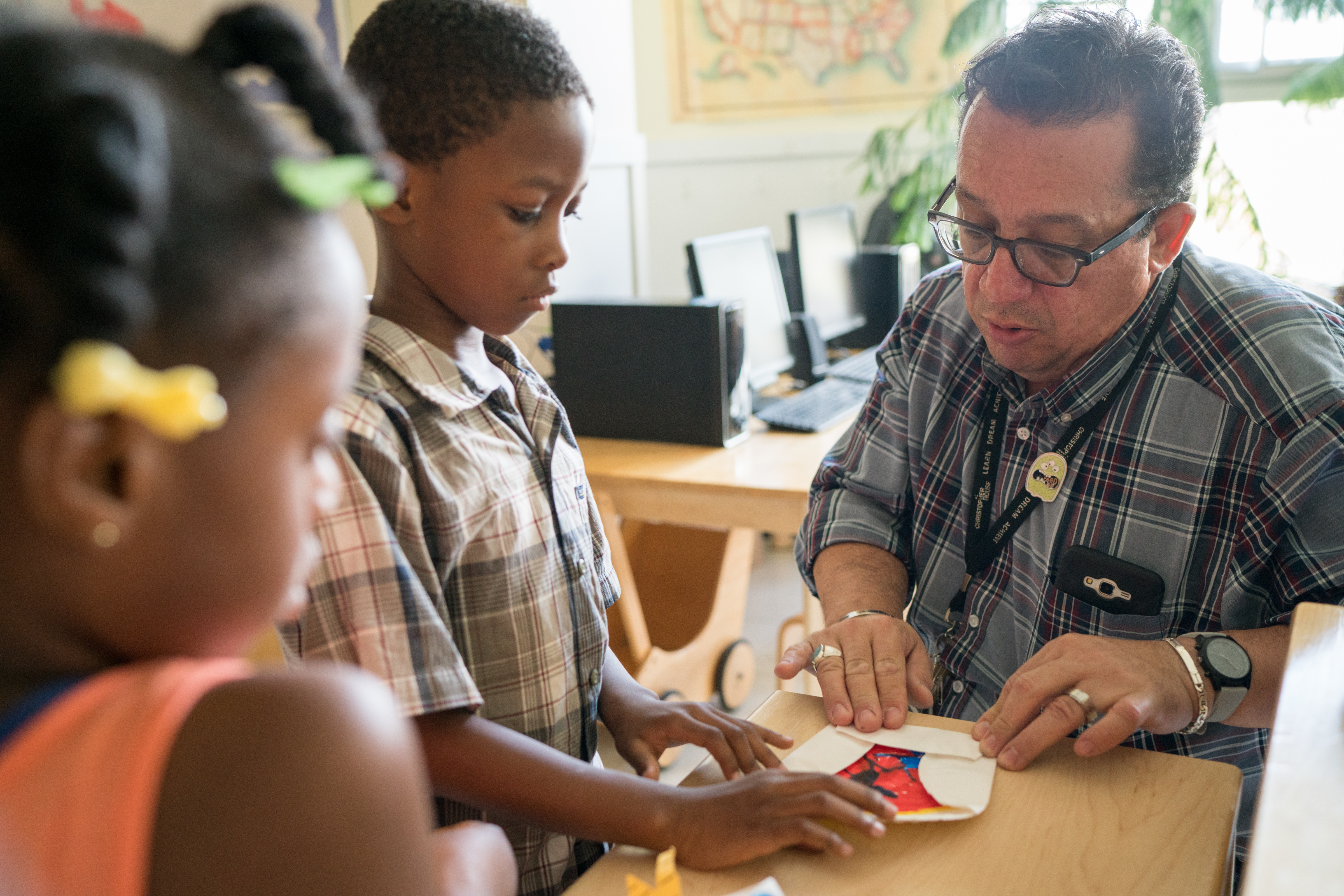 educator with 2 children